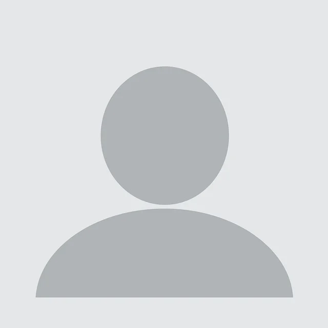 Generic gray profile picture placeholder icon with a circular head and rounded shoulder silhouette.